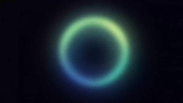 Abstract pulsing ring shape with grainy green, blue and yellow gradient, animated looping background with noise texture