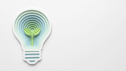 A paper cut-out illustration of a lightbulb shape containing layered green and blue paper, with a plant seedling growing in the center. Symbolizes green ideas and energy.