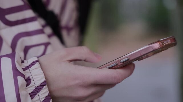 woman scrolling phone