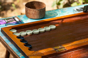 Traditional Board and Playing Backgammon Outdoors