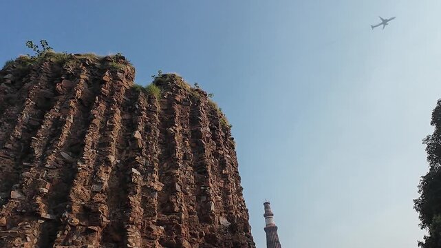 Low-Angle View of the Massive, Truncated Stone Base and Ruins of the Alai Minaret, An Unfinished Victory Tower Located in the UNESCO World Heritage Qutub Complex in Delhi.