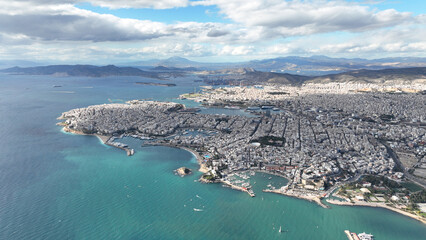 Obraz premium Aerial drone photo of famous bust port and urban seaside area of Piraeus as seen from high altitude, Attica, Greece