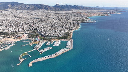 Aerial drone photo of famous port of Flisvos with luxury anchored yachts and sail boats, Faliro Marina, Athens riviera, Attica, Greece © aerial-drone