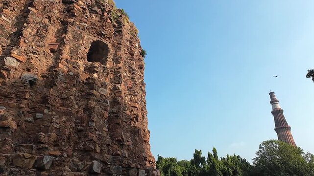 Low-Angle View of the Massive, Truncated Stone Base and Ruins of the Alai Minaret, An Unfinished Victory Tower Located in the UNESCO World Heritage Qutub Complex in Delhi.