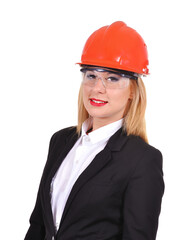 A businesswoman engineer stands in suit and  orange helmet.