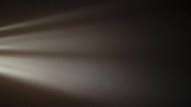 Streaking Light Rays on Dark Background image photo