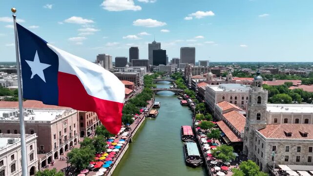 San Antonio Riverwalk buzzes with energy under Texas flag, a vibrant destination for tourism and cultural experiences in the Lone Star State