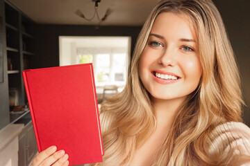 Happy blonde woman smiling at camera, holding blank red book for promoting stories or educational content