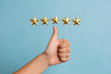 Happy human hand giving a positive thumbs-up gesture under five golden stars on a clean light blue background, symbolizing excellent 5-star rating and customer satisfaction.