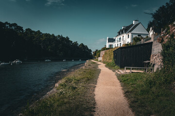 A house is on the side of a river