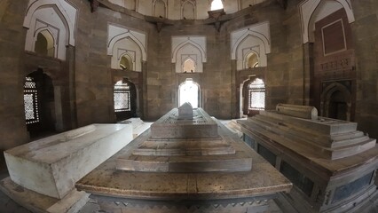 Interior View of Isa Khan's Tomb, Highlighting the Multiple Tiered Stone Cenotaphs and the Octagonal Chamber Walls with Recessed Arches in the Humayun's Tomb Complex