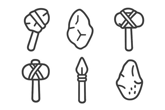 Collection of prehistoric Stone Age tools and primitive weapons including hand axes, stone hammers, and a spearhead