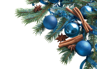 Christmas fir branches adorned with blue baubles cinnamon sticks and star anise isolated on a transparent background