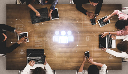 Concept of a digital human resources platform for workforce management. An applicant tracking system helps in team building by organizing employee and candidate profiles. Fermion