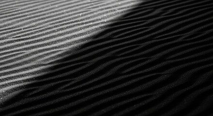 Obraz premium Abstract Sand Dune Ripples with Dramatic Light and Shadow