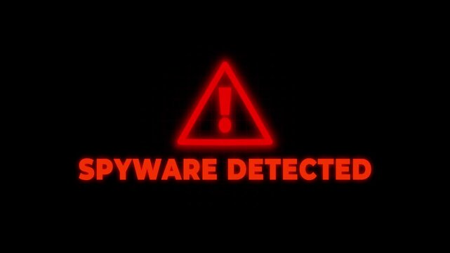 Red neon warning triangle with exclamation mark and text S P Y W A R E D E T E C T E D on dark