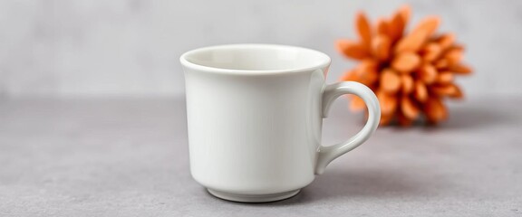 Obraz premium Classic white ceramic coffee cup, handle on right, office, empty