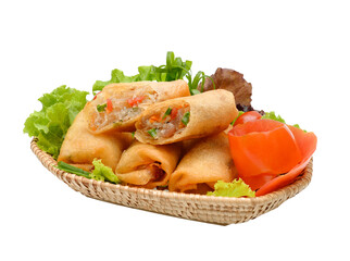 Fried spring rolls filled with cabbage, carrots and glass noodles, served with tomato salad  on transparent.