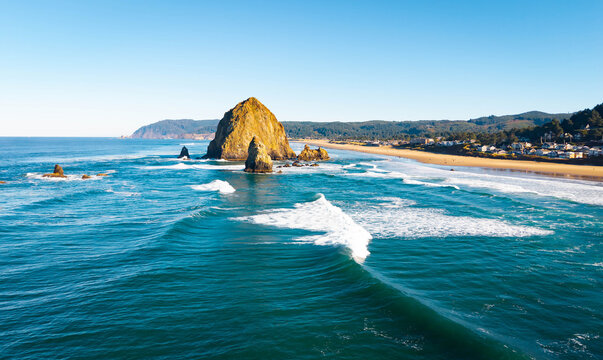 Scenic aerial view of Haystack Rock and Cannon Beach - Powered by Adobe