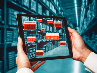 Smart warehouse management system using augmented reality technology to identify package picking and delivery . Future concept of supply chain and logistic business .