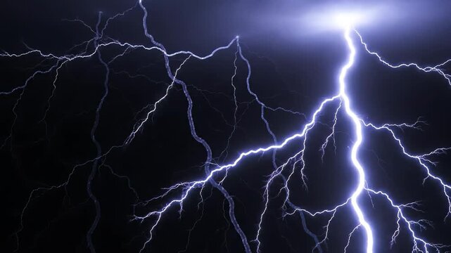 Striking lightning bolts illuminate the dark night sky creating a powerful, electric storm atmosphere perfect for dramatic visuals