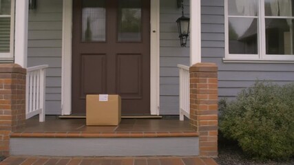 Delivery Package Left on Porch During Afternoon in Quiet Neighborhood