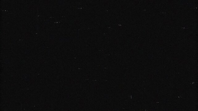 4k Retro film dust effect.Vintage film overlay, scratched old film texture, dust and noise effect.
