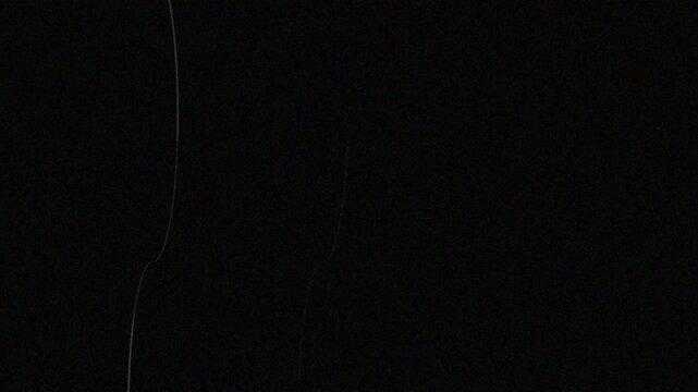 4k Vintage film linear scratches and grain texture overlay .particles, noise effects creating retro cinematic style video.