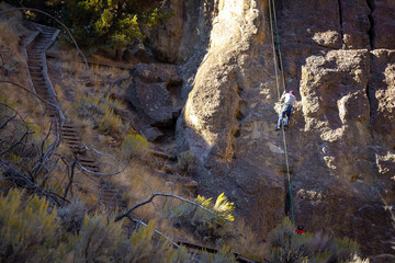 Climbers Ascending the Rocks of Smith Rock State Park on a Summer Day