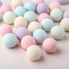 Colorful pastel spheres arranged on a soft background