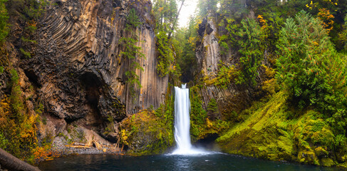 Majestic Toketee Falls Surrounded by Colorful Autumn Forest Scenery © PhotoSpirit