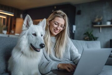 Woman and Her White Shepherd Dog Using Laptop for a Virtual Vet Visit