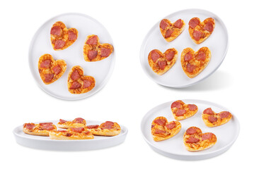 Pizza mini with salami in the form of hearts for Valentine's day holiday on a white isolated background
