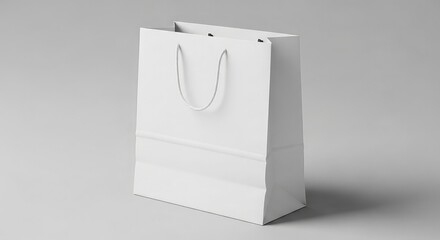 White paper bag with handles isolated on white background for shopping