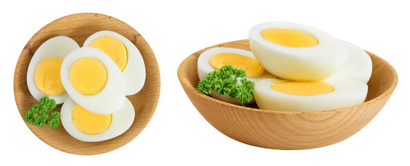 Boiled chicken egg in wooden bowl isolated on white background. Top view. Flat lay