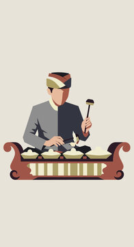 Man playing traditional Indonesian Gamelan musical instrument.
