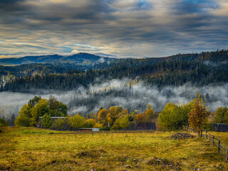 Misty Autumn Rain Clouds over Ukrainian Carpathian Mountains.