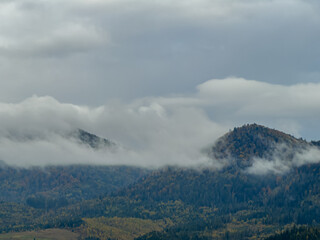 Misty Autumn Rain Clouds over Ukrainian Carpathian Mountains.