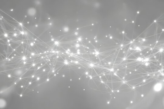 Abstract glowing particles and light streaks on a soft gray background