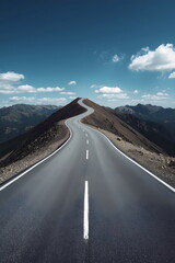 Naklejka premium Winding asphalt mountain road with blue sky and clouds