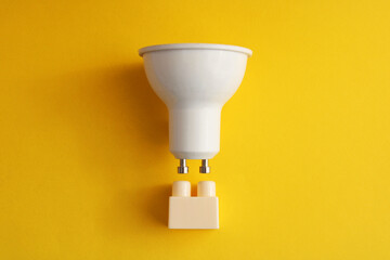 Light bulb with a connection similar to a puzzle piece, an idea for different solutions