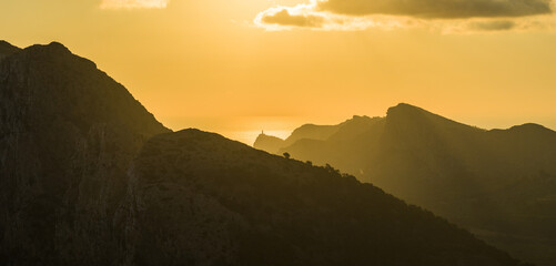 Golden sunset over the cliffs of Cap de Formentor, Mallorca, Spain. Breathtaking Mediterranean...