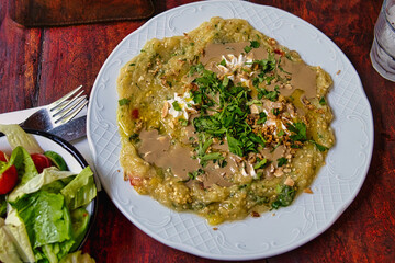Baba Ghanoush with Tahini and Fresh Salad on Rustic Table