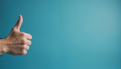Hand showing thumbs up gesture. Male hand expresses acceptance on blue background. Positive sign approval success agreement. Concept of feedback like, positive review. Space for text mockups.