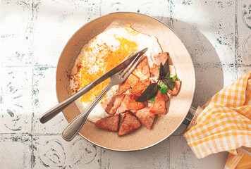 Breakfast, fried eggs with sausage, in a frying pan, sunlight, no people,