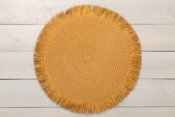 Kitchen napkin on wooden background, top view