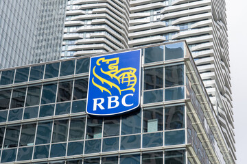 Fototapeta premium Toronto, Canada - September 21, 2025: Close up of RBC (Royal Bank of Canada) logo sign on the building. Toronto, Canada. RBC is a Canadian multinational financial services company. 