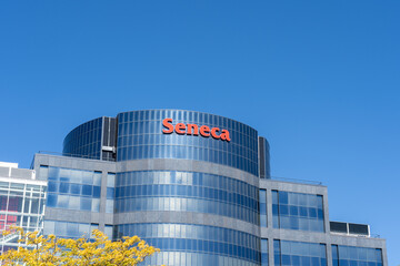 Fototapeta premium Markham, Ontario, Canada - September 21, 2025: Close up of Seneca sign on the building at Seneca College Markham campus. Seneca College of Applied Arts and Technology is a public college in Toronto.