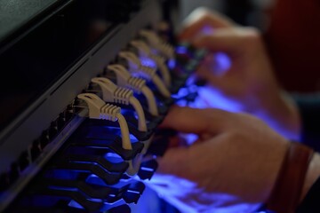 IT expert working with computer server network cable. Connectivity, Internet, technician, installing.