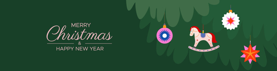 Christmas banner with a Christmas tree and Christmas toys on a green background. Minimalistic Christmas web banner.